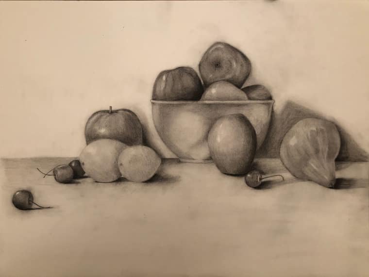 Charcoal still life of apples, pears, and cherries around a bowl of fruit